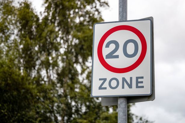imported-0_Red-circle-road-safety-suburban-slow-traffic-calming-sign-with-20mph-speed-limit-restriction-zone-street-sign.jpg