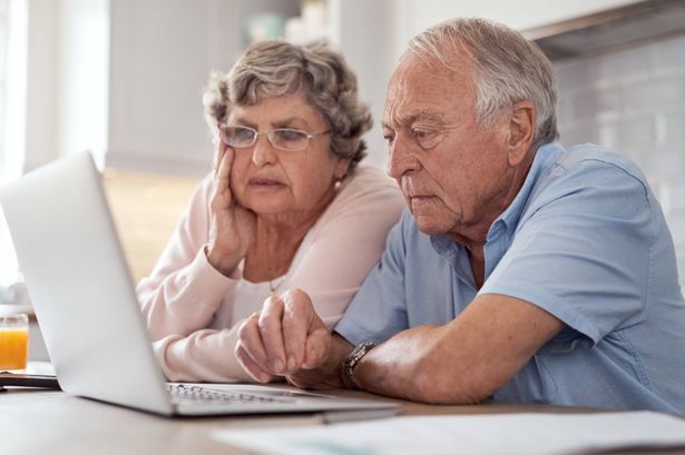 imported-0_Shot-of-an-elderly-couple-using-a-laptop-together-in-the-kitchen-at-home.jpg