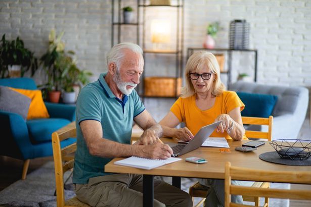 imported-0_Senior-couple-using-laptop-while-planning-their-home-budget.jpg