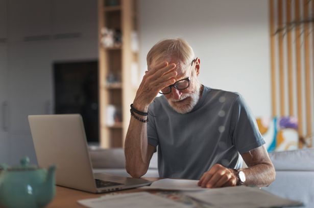 imported-0_Senior-man-reading-touching-letter-from-friend-notification-about-increased-healthcare-costs-bad-medical-test-results.jpg
