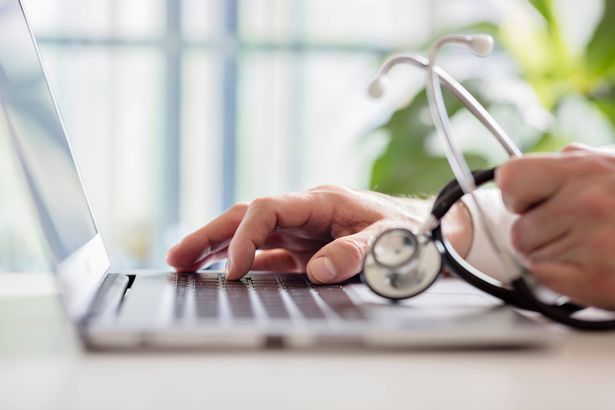 imported-0_Doctor-entering-patient-notes-on-laptop-in-surgery.jpg