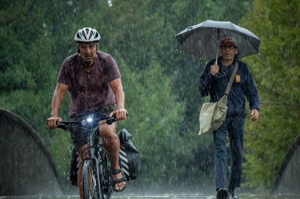 imported-1_Floods-swamp-British-roads-causing-chaos-for-commuters.jpg