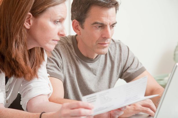 imported-0_Caucasian-couple-paying-bills-online.jpg