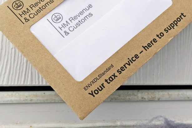 imported-0_Tax-demand-letter-coming-through-mail-box-in-door.jpg