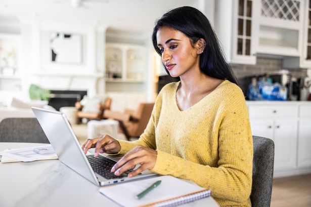 imported-0_Young-woman-working-on-laptop-at-home.jpg