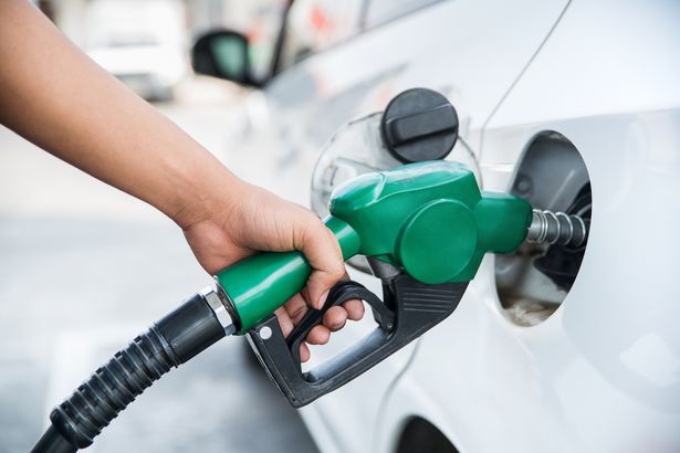imported-2_handle-fuel-nozzle-to-refuel-the-car.jpg