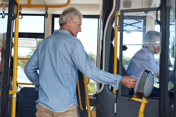 imported-0_Mature-man-using-travel-card-to-pay-for-bus-ride.jpg