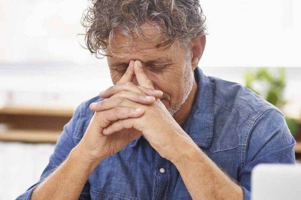 imported-1_Stressed-man-looking-at-paperwork.jpg