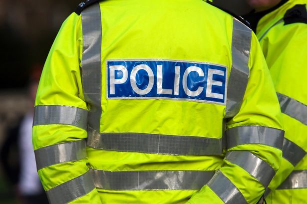 imported-8_Back-view-of-a-police-officer-in-reflexive-jacket.jpg